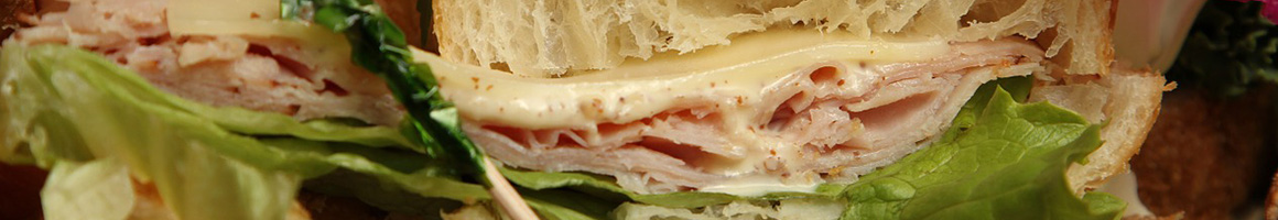 Eating Greek Middle Eastern Sandwich at Little House Café restaurant in Vineyard Haven, MA.